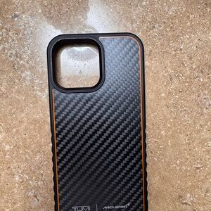 Tumi black and orange McLaren iPhone case 16 pro max